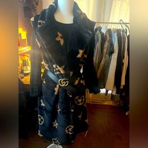 Long faux fur coat brand new.